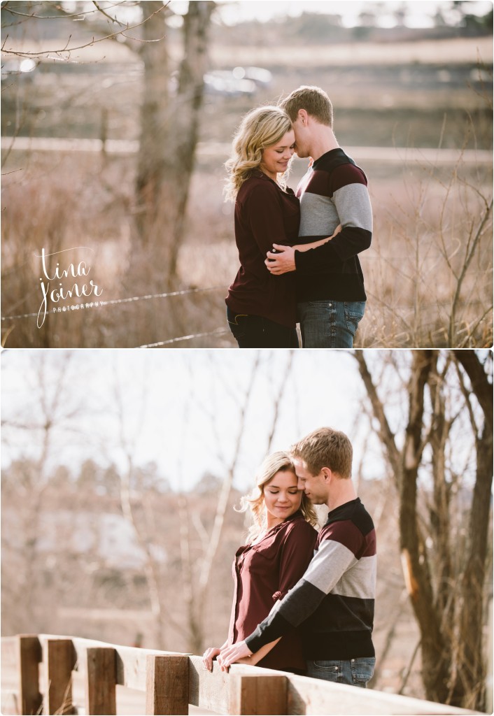 In the top picture, a man in a wide-striped sweater whispers sweet nothing into his sweetheart's ear, she smiles sweetly, the couple is standing in a field with bare trees behind them looking away from camera, in the bottom image a man and woman snuggle along a split rail fence, the woman's back is to the man's chest and their faces are turned toward each other, there are bare trees behind them