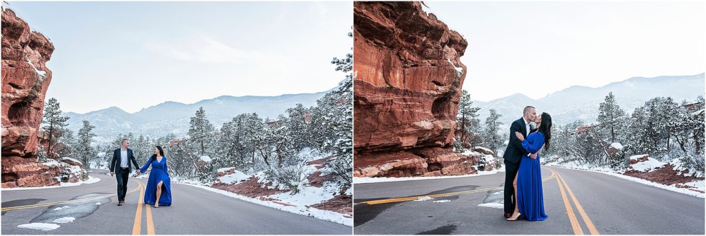 Couple walks on the road through Garden of the Gods near balance rock in winter where snow and ice are everywhere