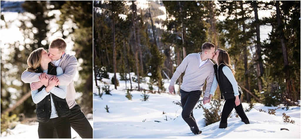 Spencer and Jessica stand in deep snow and kiss near Sapphire Point, near Breckenridge Colorado