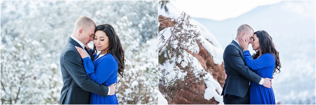Engaged couple romantically embracing in winter at Garden of the Gods