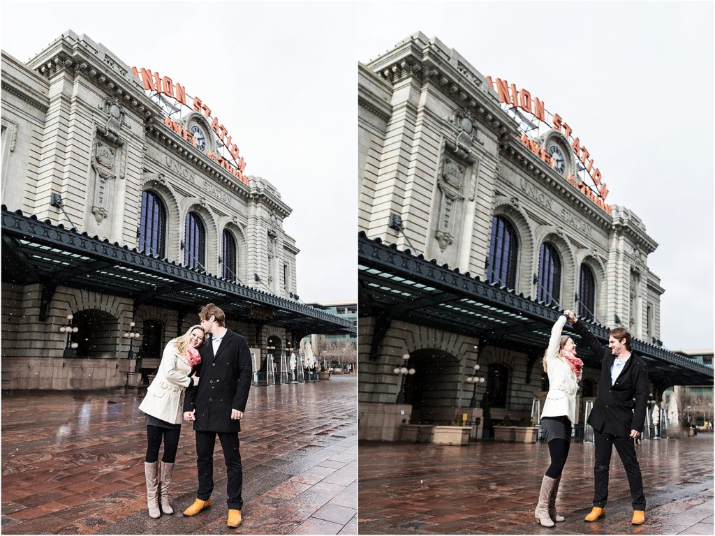 Engaged couple dance in front of Union Station in Denver Colorado in winter