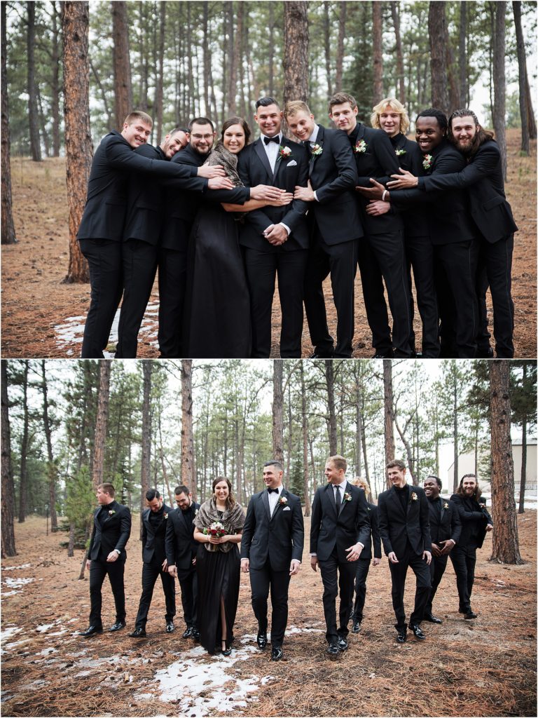 groom and his groomsmen, one lady included, laugh and have a good time during photos