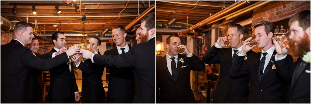Groom and groomsmen share a toast of whiskey before the ceremony in the grooms room at the Manor House in Littleton, Colorado