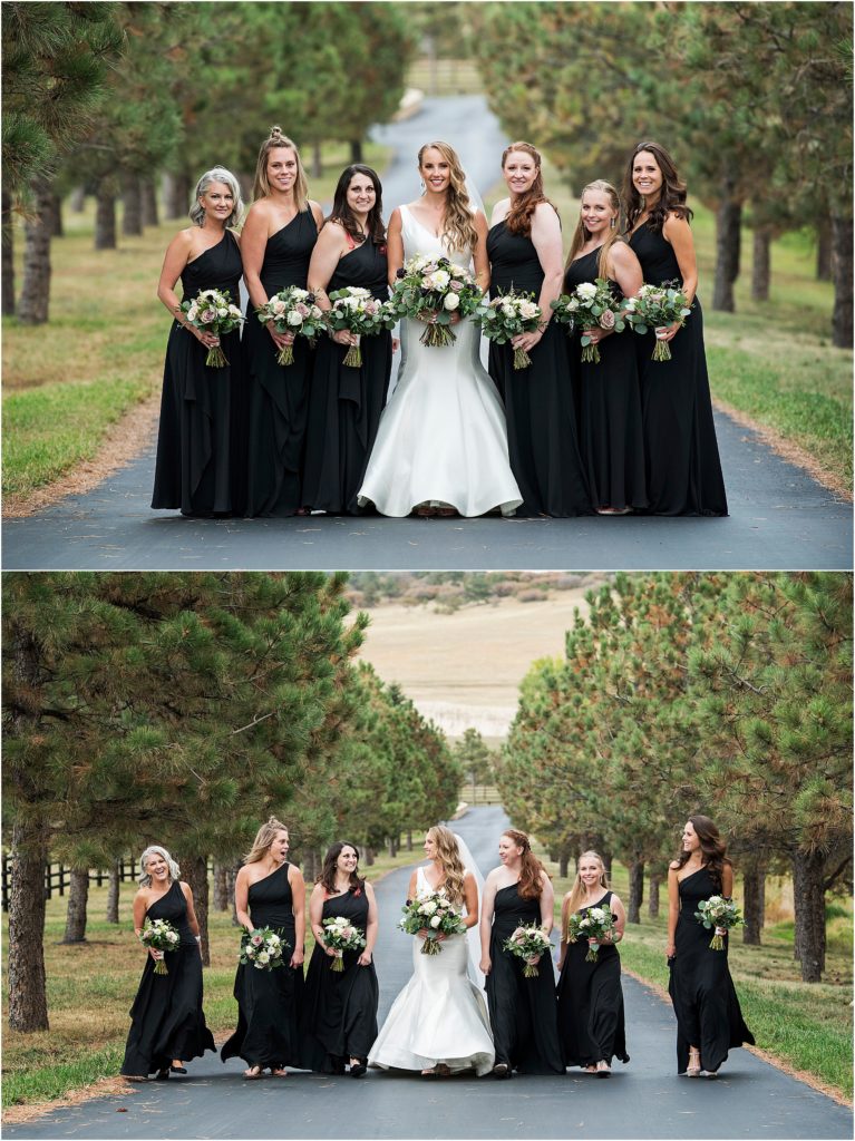 Lacy and her bridesmaids stand on a roadway lined with evergreen trees at Spruce Mountain Ranch.