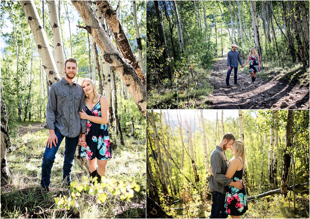 Darla and Nate walk together and embrace in the Colorado Aspen trees.