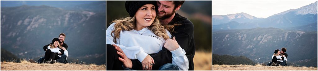Andrew and Martha sit on a mountain top and embrace each other during their engagement photography session
