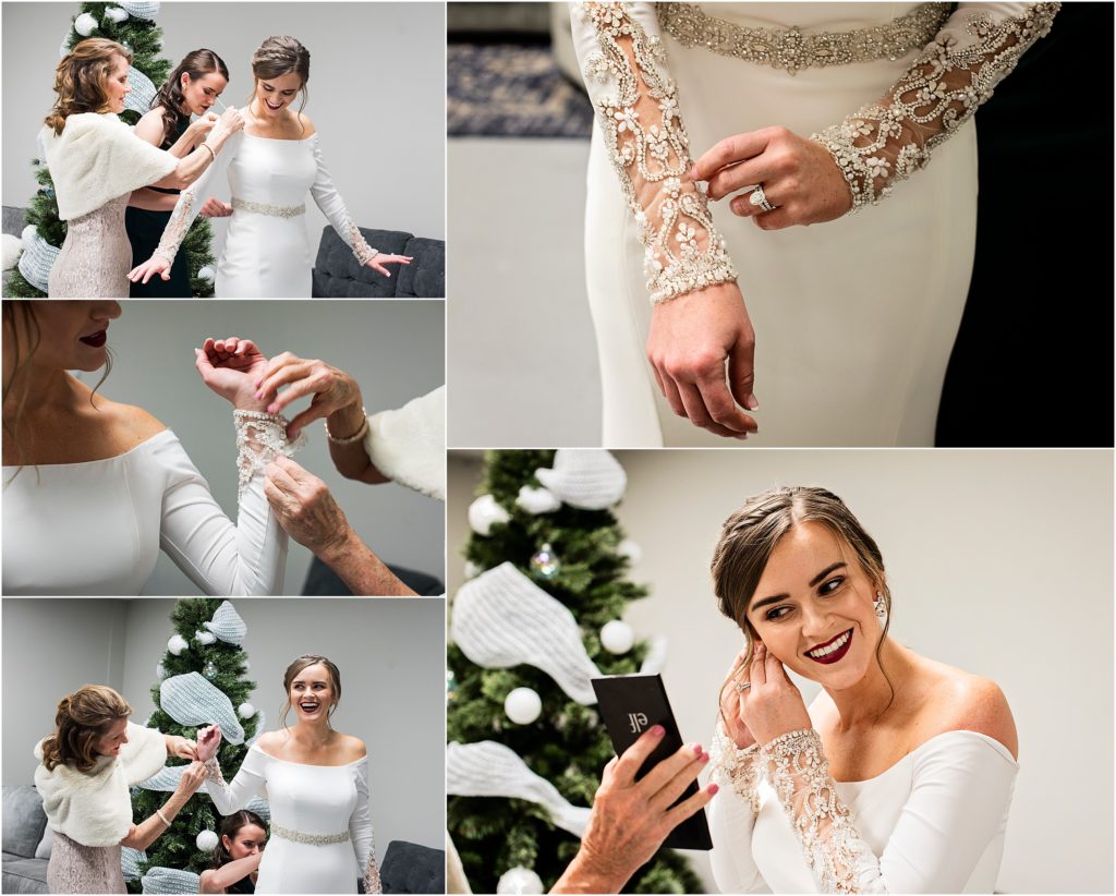 Erin gets dressed on her wedding day in her wedding dress with lace long sleeves decorated with rhinestone details.