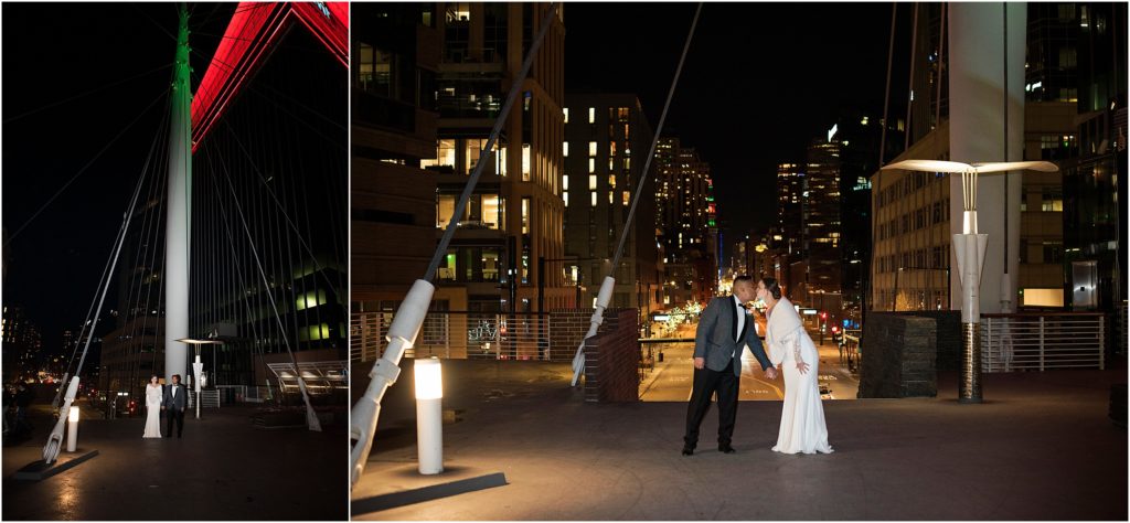 Bride and groom take photos outside at night in Denver.