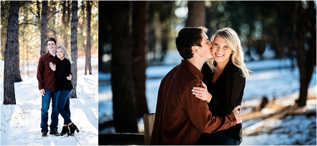 couple stands in snow during their engagement session in black forest in colorado during their winter engagement session