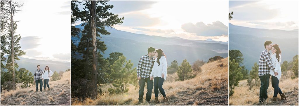 couple holds hands together in the mountains during their engagement session near colorado springs.