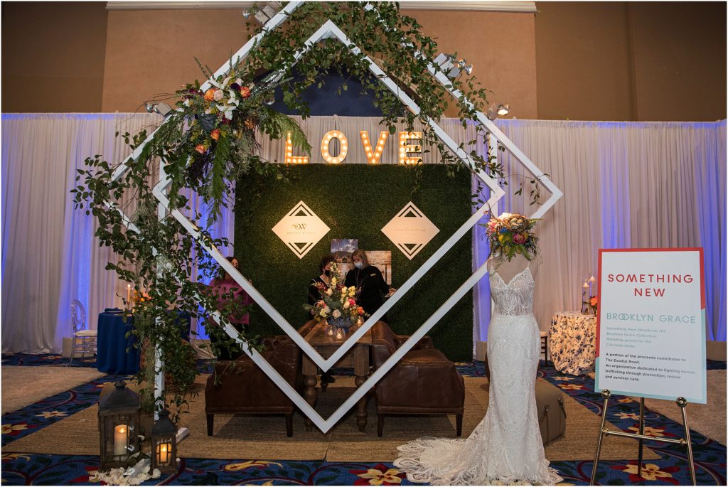 Beautiful geometric floral display at Something New Boutique's 2021 Cheers Bridal Show