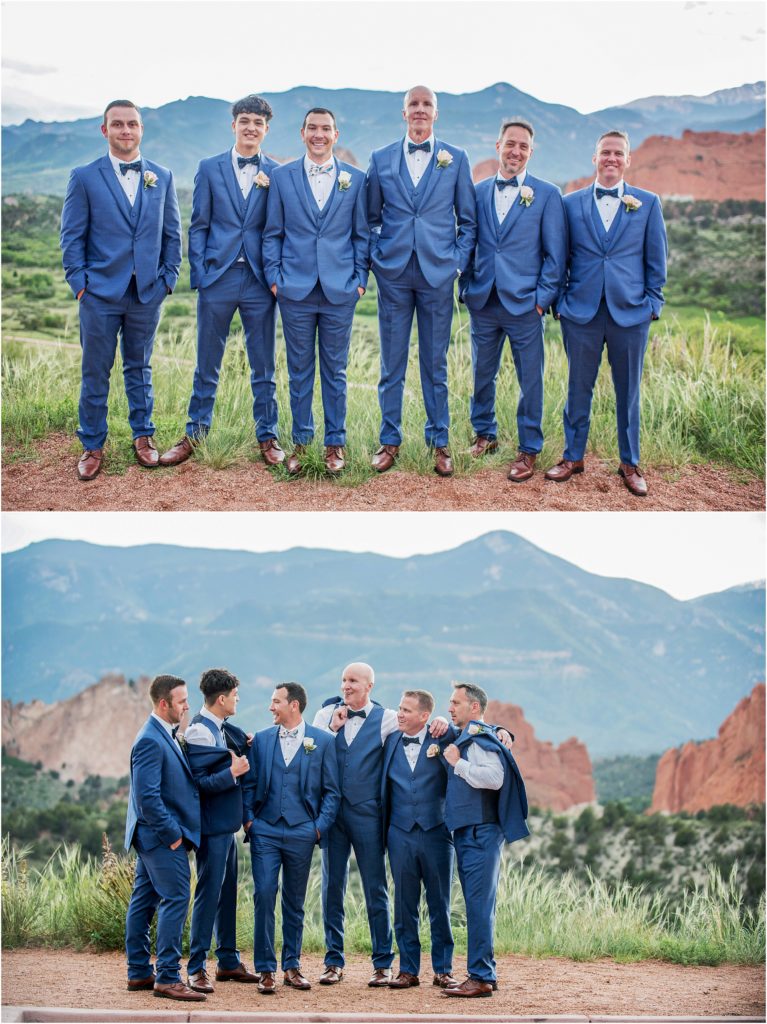 Groom and groomsmen dress cobalt blue suits and bowties with pink boutonnieres with mountains behind them