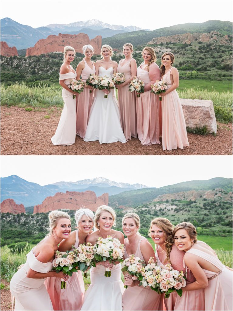 Bride and Bridesmaids pose with pink bouquets in front of Pikes Peak