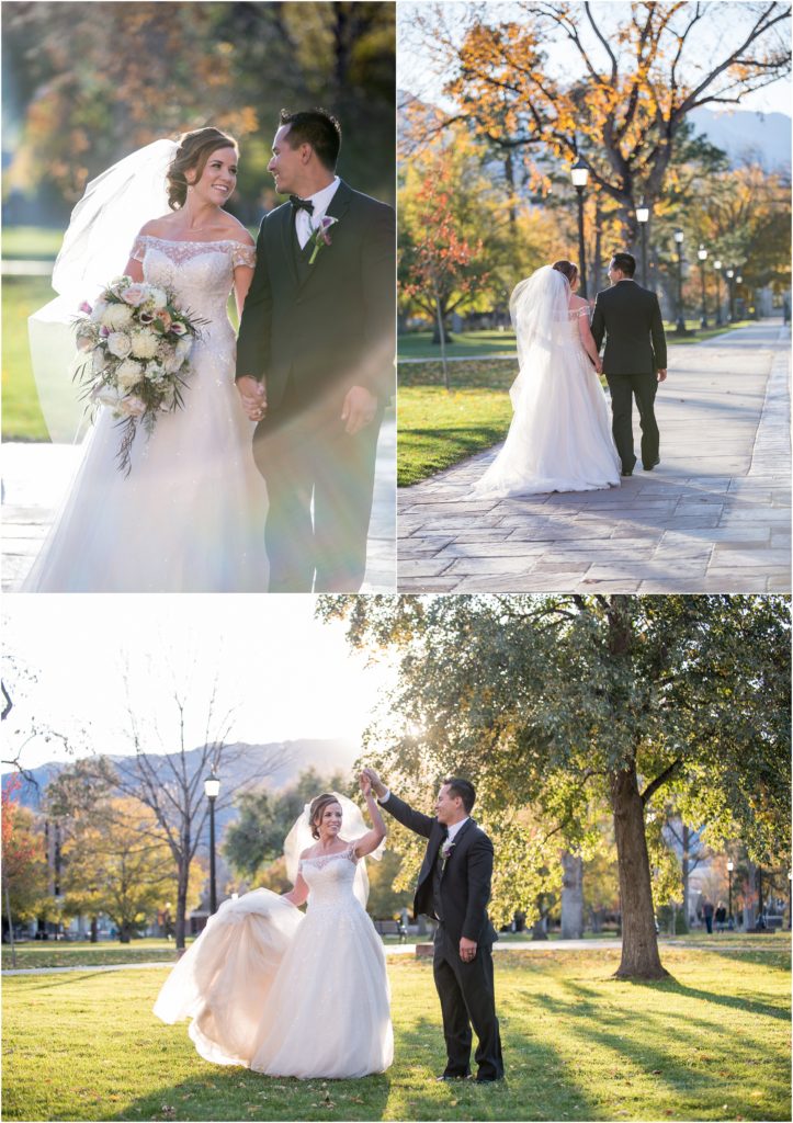 A young bride and groom smile at each other while holding hands and walking down a stone paved walkway at Colorado College in Colorado Springs