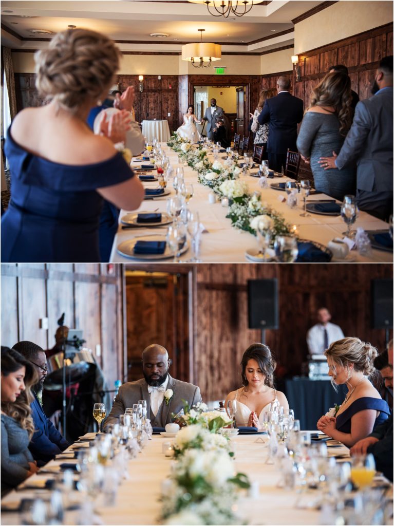 Bride and groom share a large table with all of their guests who attend their small wedding at an award winning wedding venue in Colorado Springs