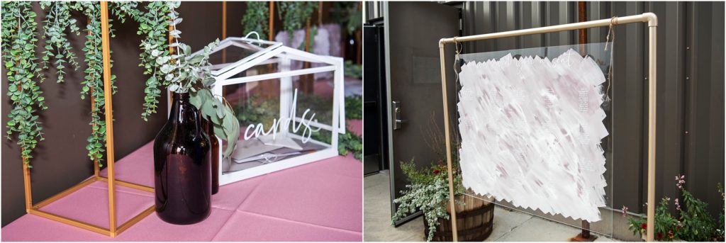 Simple modern design for wedding guest table has trailing greens and white terrarium to hold cards; the guests' table assignments are displayed on artistic plexiglass