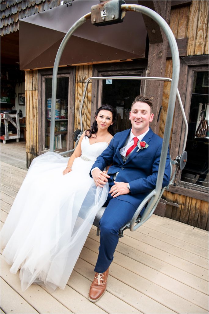 Steamboat Springs, Colorado outdoor wedding photo captures bride and groom on a ski lift