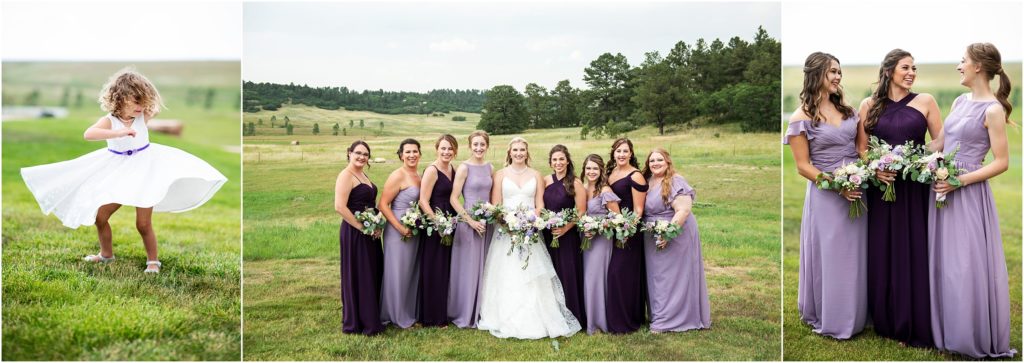 Flower girl twirls in her white dress with purple detail as bridesmaids pose beautifully in their purple and lavender floor length dresses