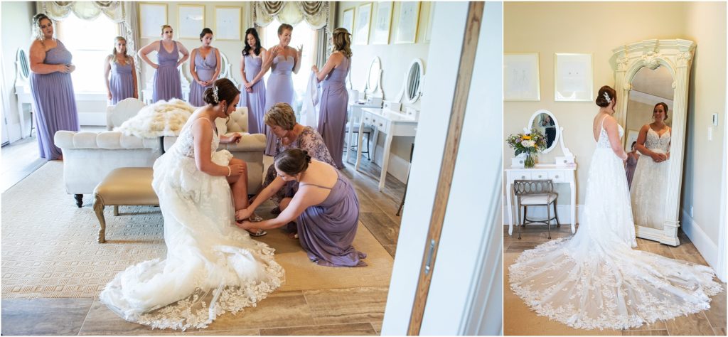 Bridesmaids in lilac dresses and bride in lace, thin strapped wedding dress in bridal suite prior to the ceremony