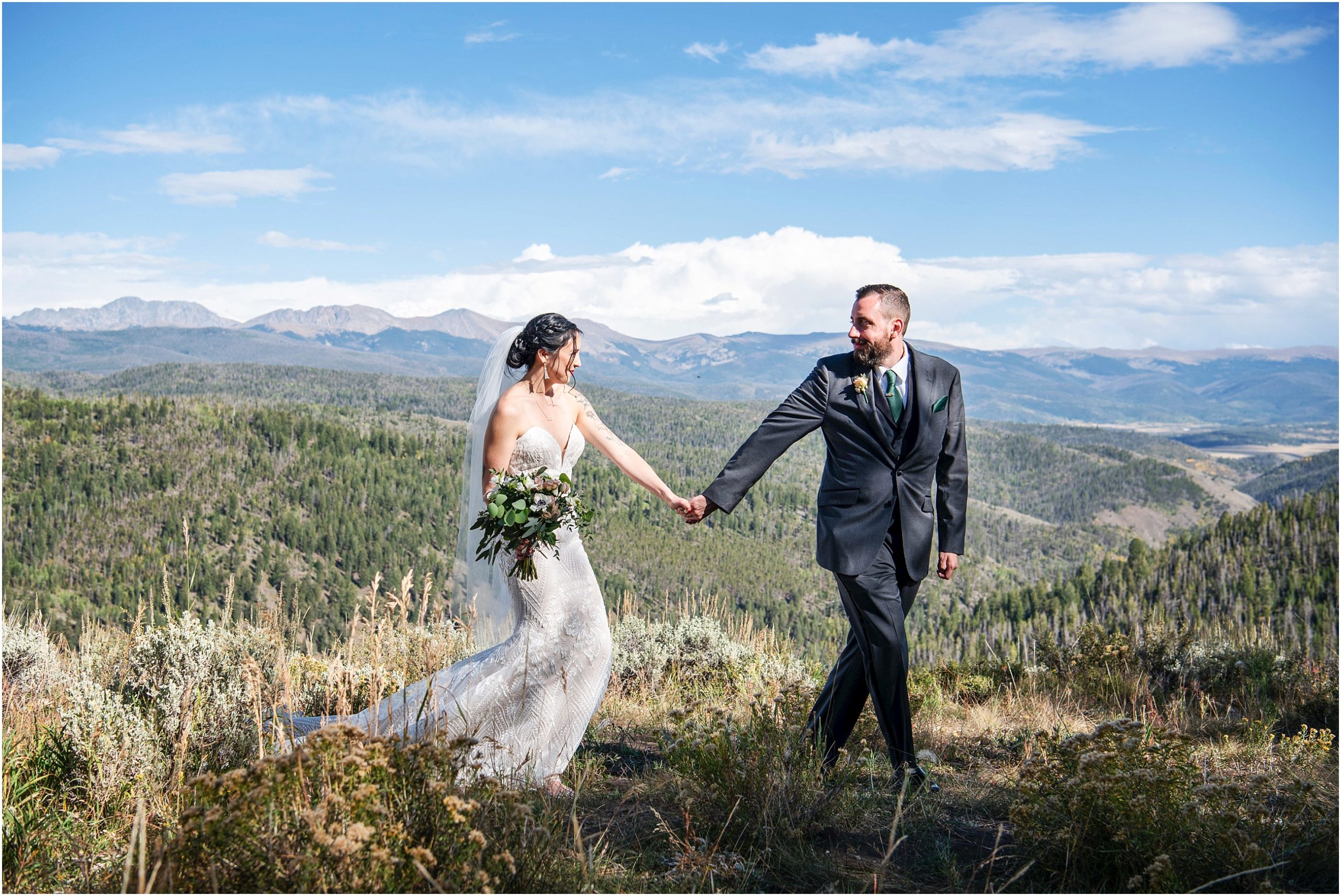 Colorado mountains serve as the perfect backdrop for this outdoor summer wedding ceremony