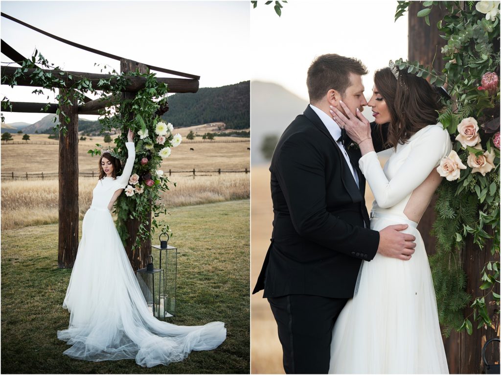 Bride is elegantly surrounded by her florals while her bride leans in for a kiss