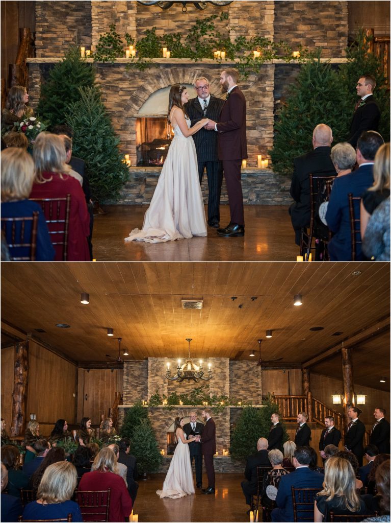 Bride and groom exchange vows in front of their friends and family with a large fireplace at their winter December wedding