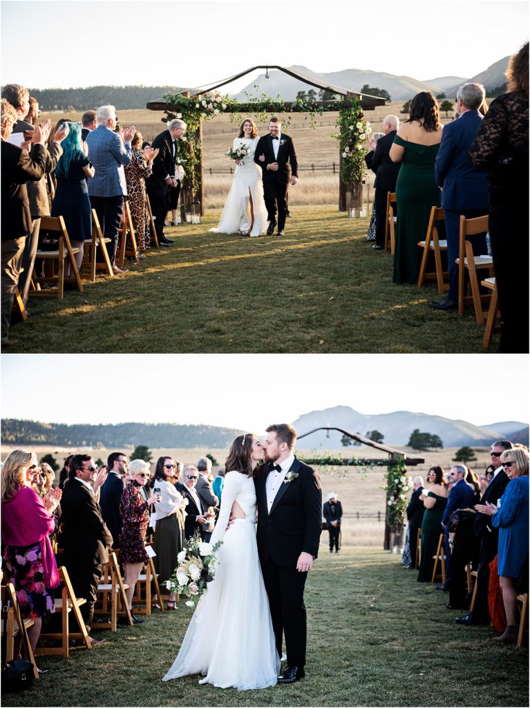 Bride and groom exit their outdoor ranch wedding in Colorado as their guests cheer