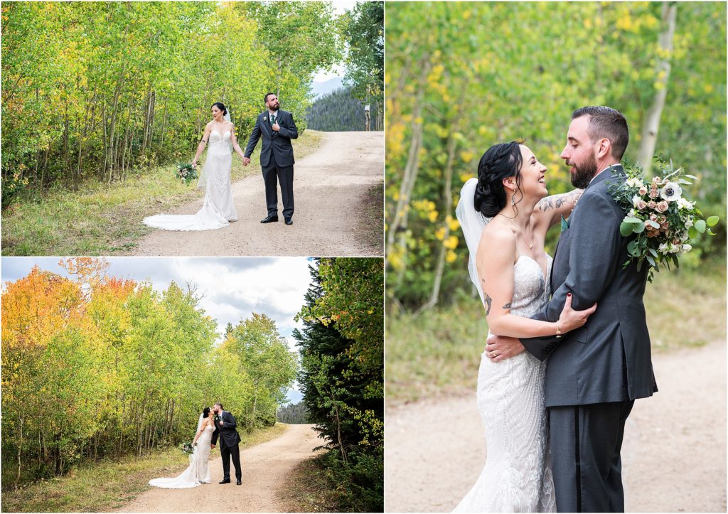 Bride and groom hold hands and embrace on their wedding day in the mountains of Colorado in fall