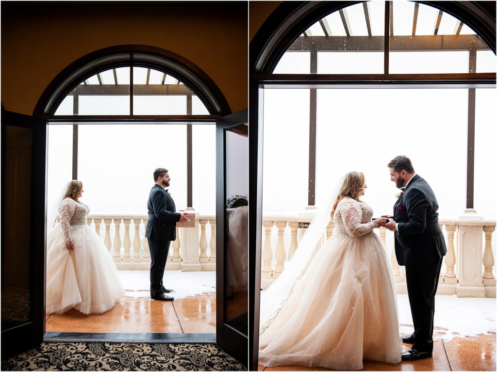 Bride and groom share a first look on a balcony at The Pinery in Colorado Springs at their winter wedding