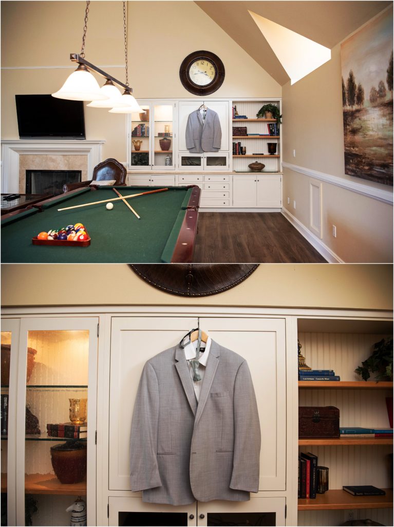 Grooms suit hangs behind a pool table at Flying Horse Ranch in the upstairs grooms quarters