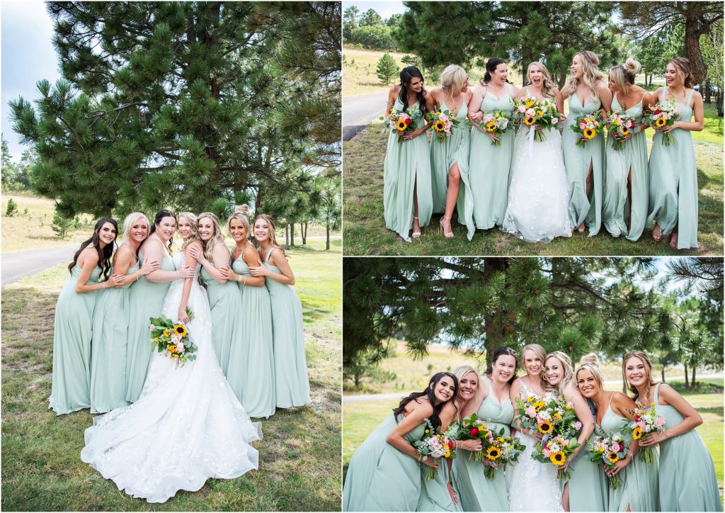 Bride smiles and laughs with bridesmaids who are wearing sage at this summer wedding in Colorado