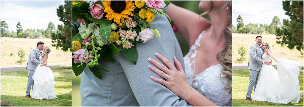 Bride holds bouquet of sunflowers, stock, and roses while she embraces her groom