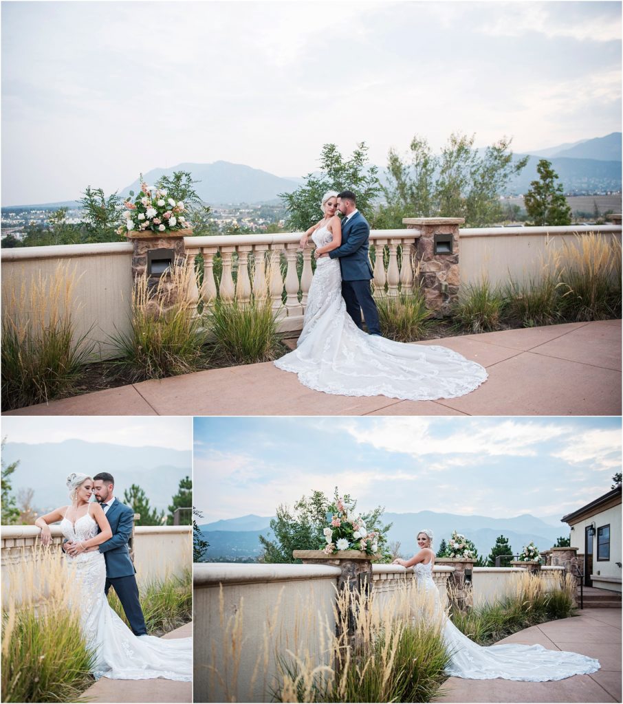 Bride and groom stand together on a balcony overlooking Colorado Springs at their wedding